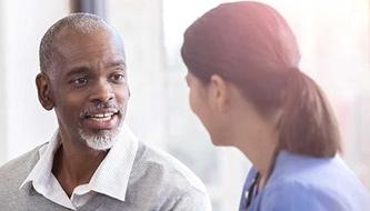 Patient asking his nurse questions.